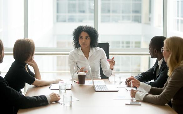business meeting discussing procurement strategies